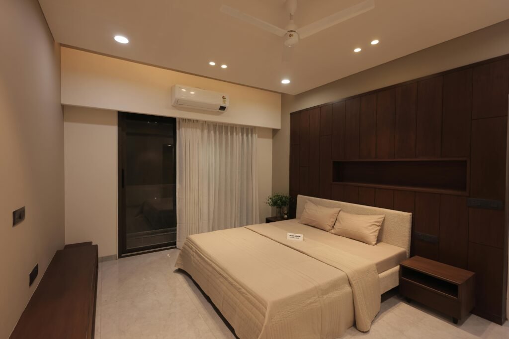Contemporary bedroom design featuring wooden accents and soft lighting for a cozy ambiance.